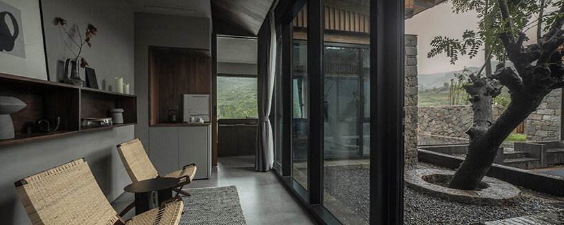 line+ studio renovates 12 stone structures as part of redeveloped village in china