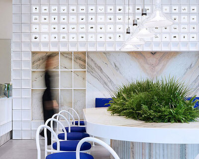 illustrated blocks clad tea shop interior by raams architecture studio in shanghai