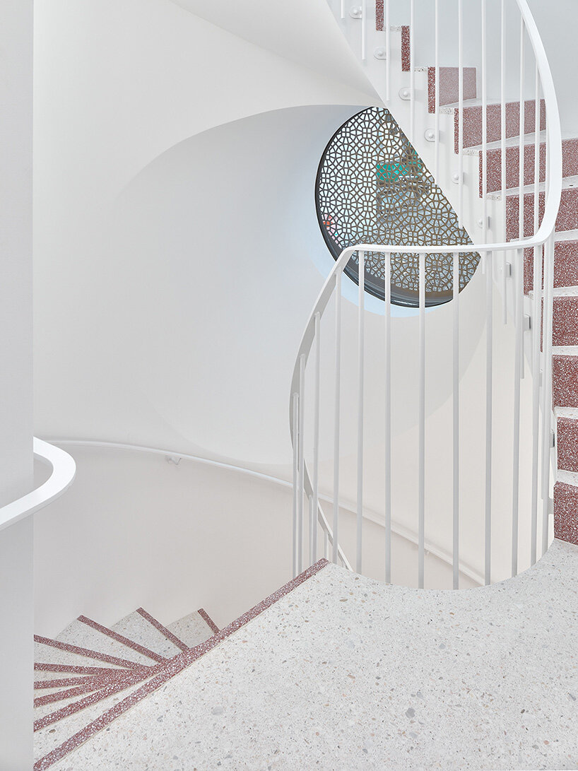 knorr & pürckhauer tops courtyard building in zurich with pre-oxidized copper roof