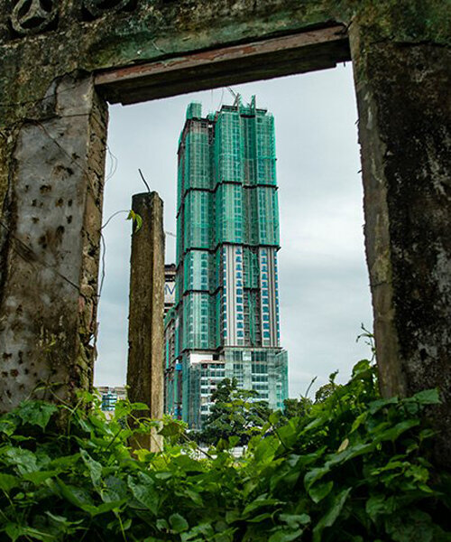 unfinished towers coexist with malaysia's tropical landscape in this photo series