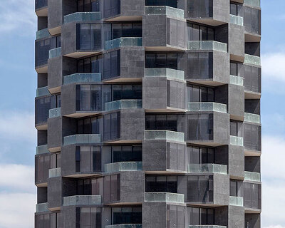 mayer hasbani builds 'adamant' sculptural high-rise in puebla, mexico