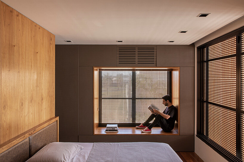 mf+arquitetos clads 'house of jabuticabeiras' in brazil with adjustable wooden louvers