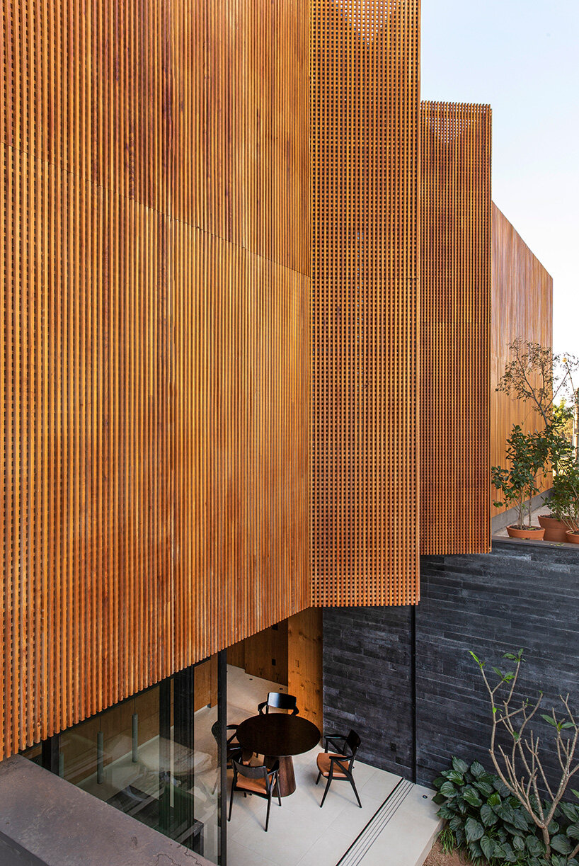 mf+arquitetos clads 'house of jabuticabeiras' in brazil with louvers