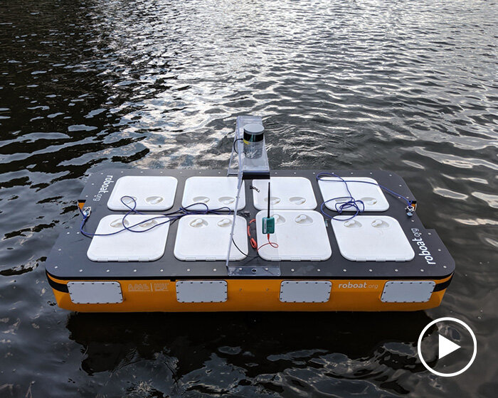 the roboat II by MIT is an autonomous vessel that can carry passengers around amsterdam