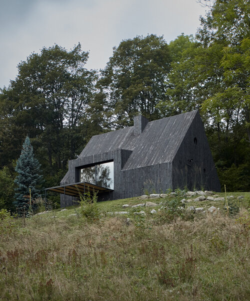 mjölk architekti wraps its cottage pod bukovou in a skin of blackened timber
