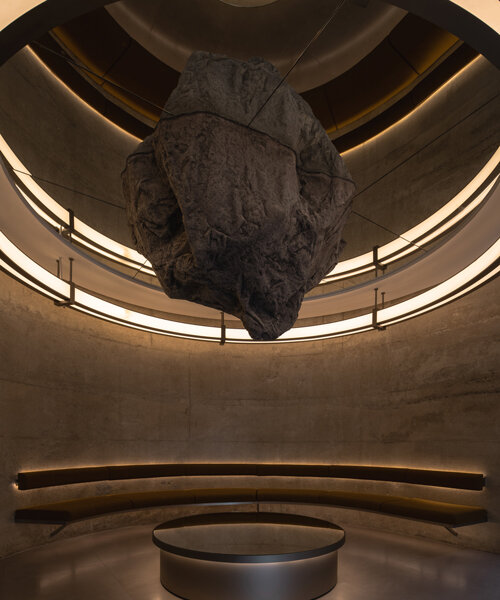 MOJO STUDIO puts a huge boulder at the center of this salon refurb in chengdu