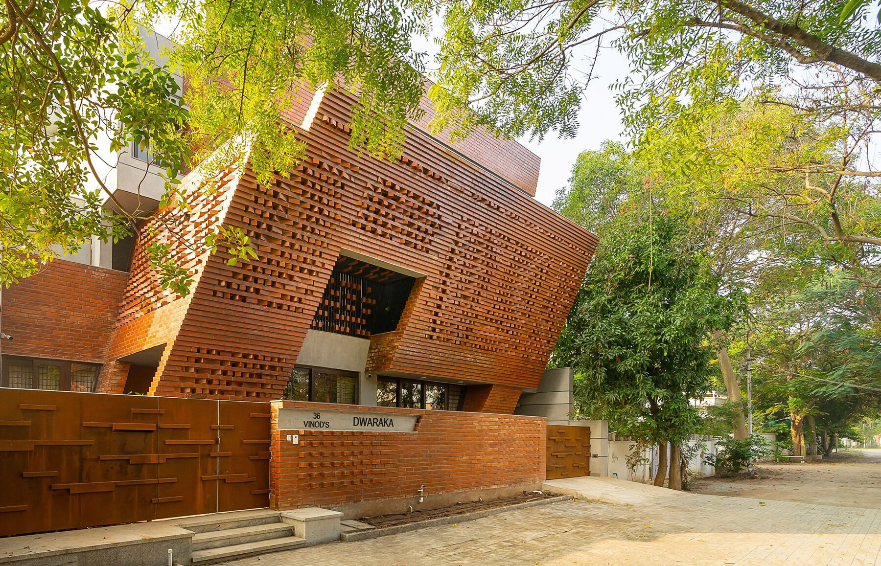 murali architects clads family residence in dynamic brick façade in india