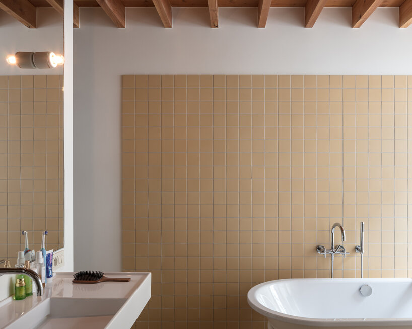 NU architectuuratelier completes a narrow split-level house in ghent designboom