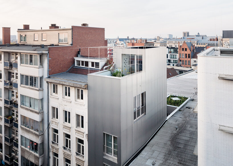 NU architectuuratelier completes a narrow split-level house in ghent designboom