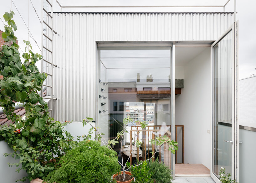 NU architectuuratelier completes a narrow split-level house in ghent designboom