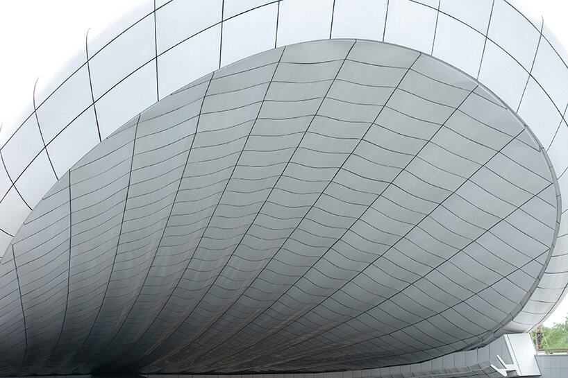 penda china's sculptural tunnel portals add 'tinge of surrealism' to haikou