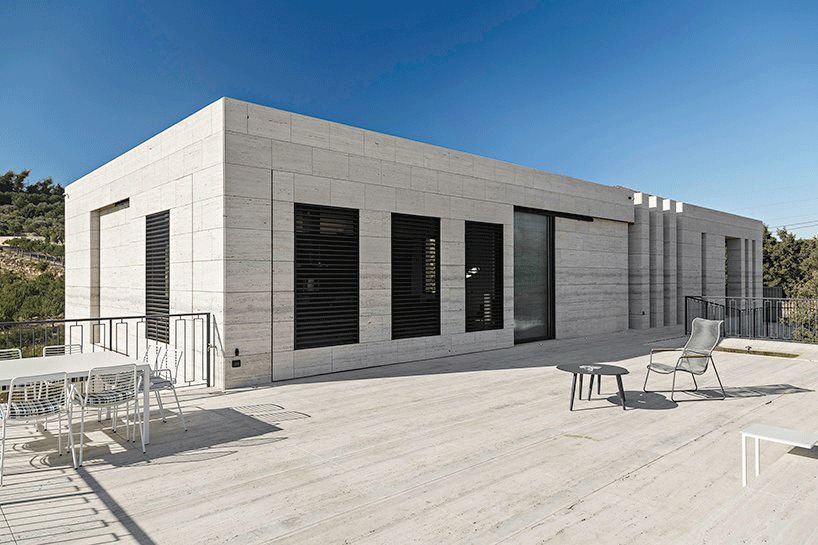rab architects designs a house with sliding travertine walls in lebanon designboom