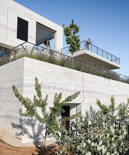 rab architects designs a house with sliding travertine walls in lebanon