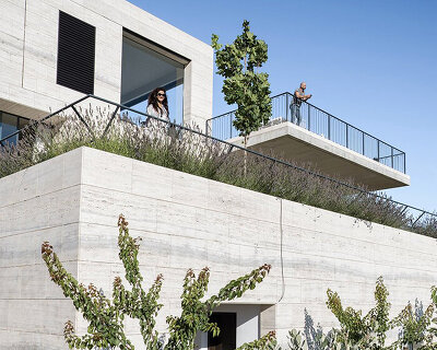 rab architects designs a house with sliding travertine walls in lebanon
