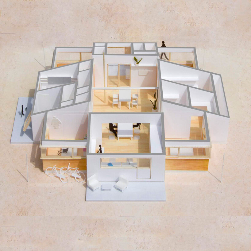 shinta hamada architects tops 'house U' in japan with large roof + triangular skylight