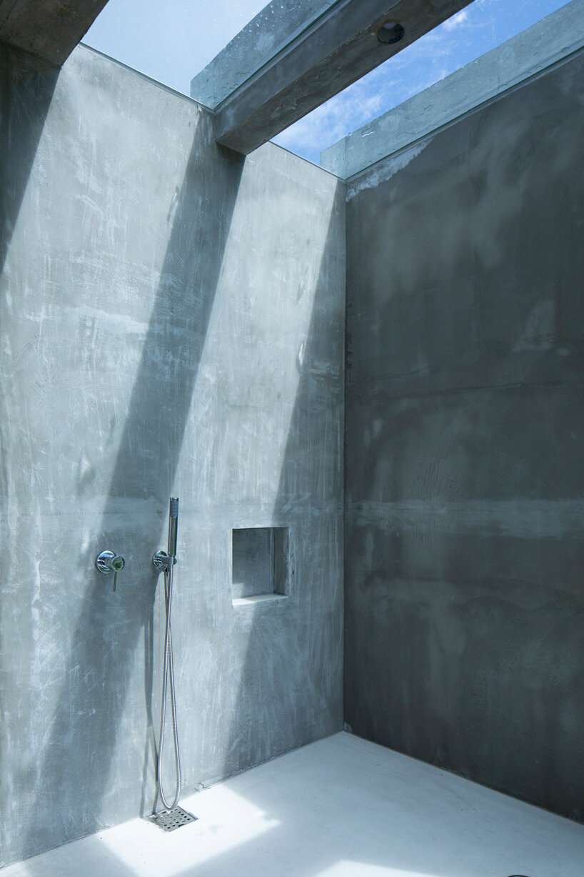 studio cochi architects completes concrete house + workshop in japan's okinawa island