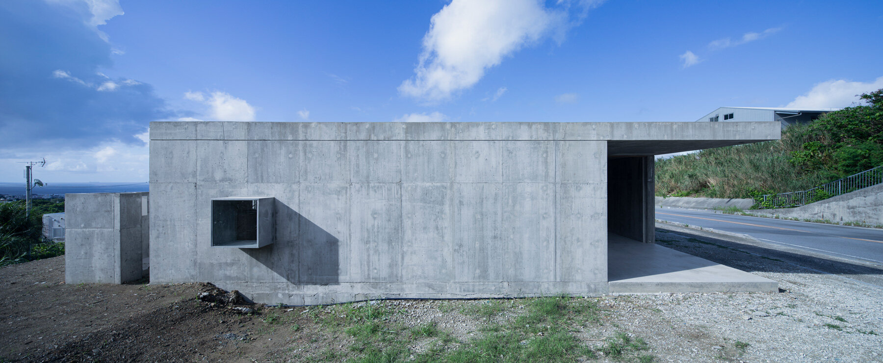studio cochi architects completes concrete house + workshop in japan's okinawa island