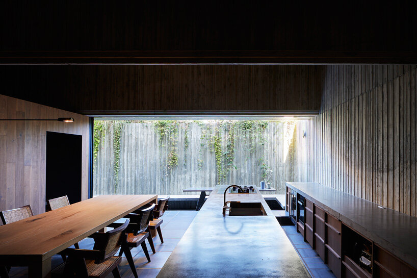 suppose design office builds house T in tokyo as concrete box with wood ...