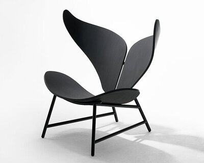 whale chair by woocheol shin incorporates smooth curves found in nature