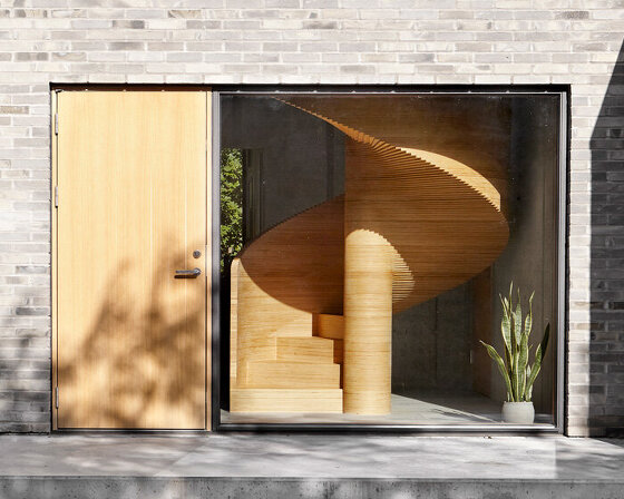 tommy rand completes family house in denmark with spiral plywood staircase