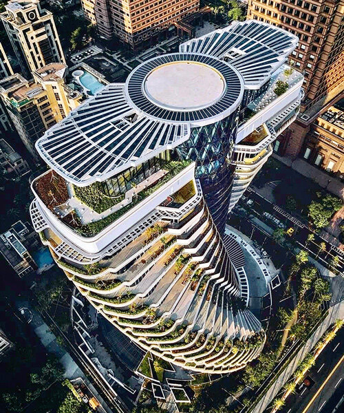 vincent callebaut's twisting carbon-absorbing tower nears completion in taipei
