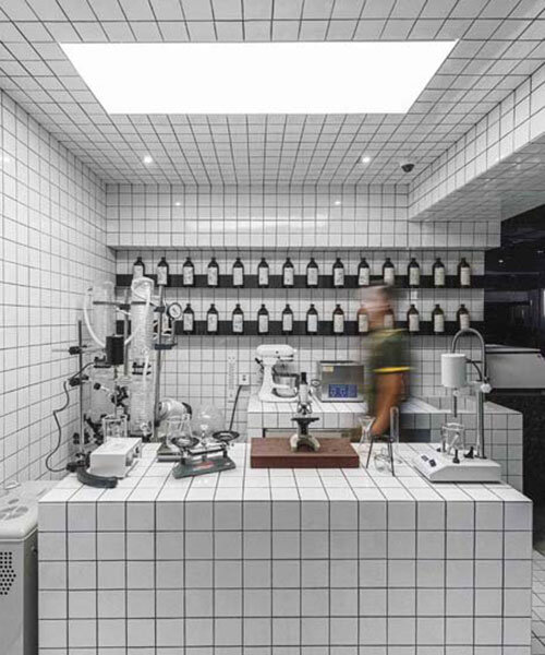 white tiles clad interior of sustainable concept bar 'penicillin' in hong kong