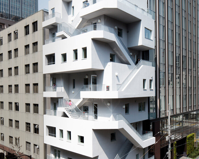 NIKKEN SEKKEI wraps façade of ARAKAWA office building in emergency staircases
