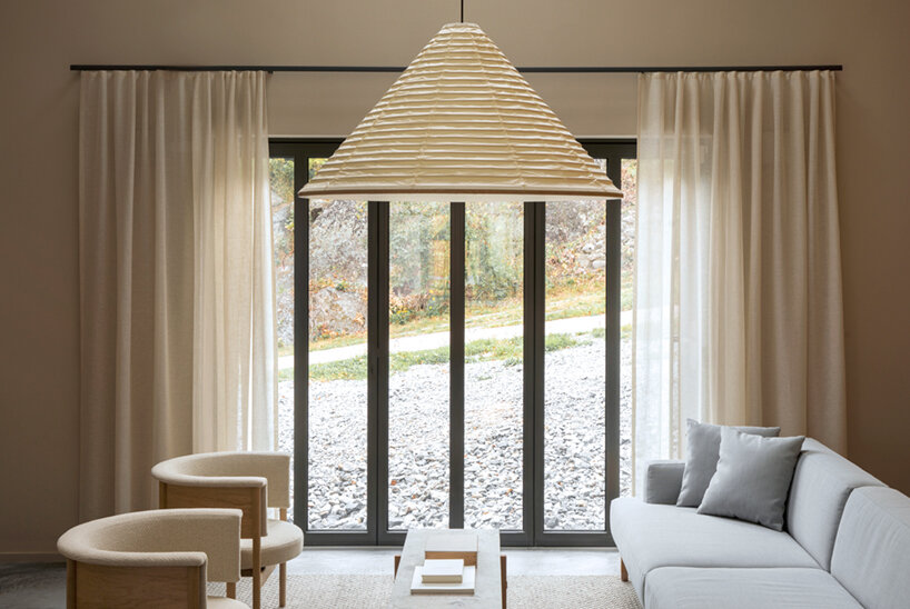 with its archipelago house, NORM architects wraps the coast of sweden in timber