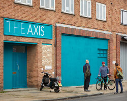 alma-nac turns a two-story brick warehouse into music studios in south london