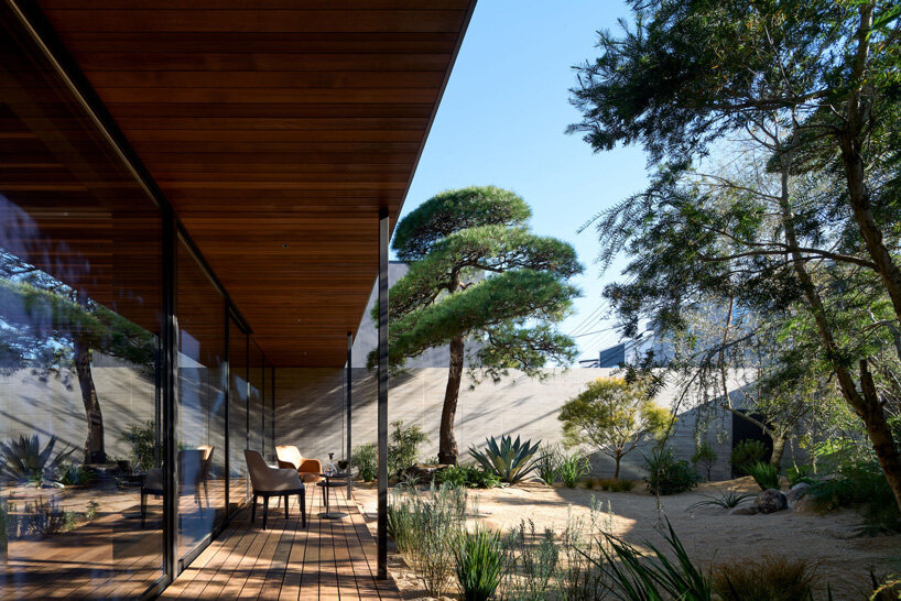 apollo architects & associates develops 'noble house' in japan around verdant garden