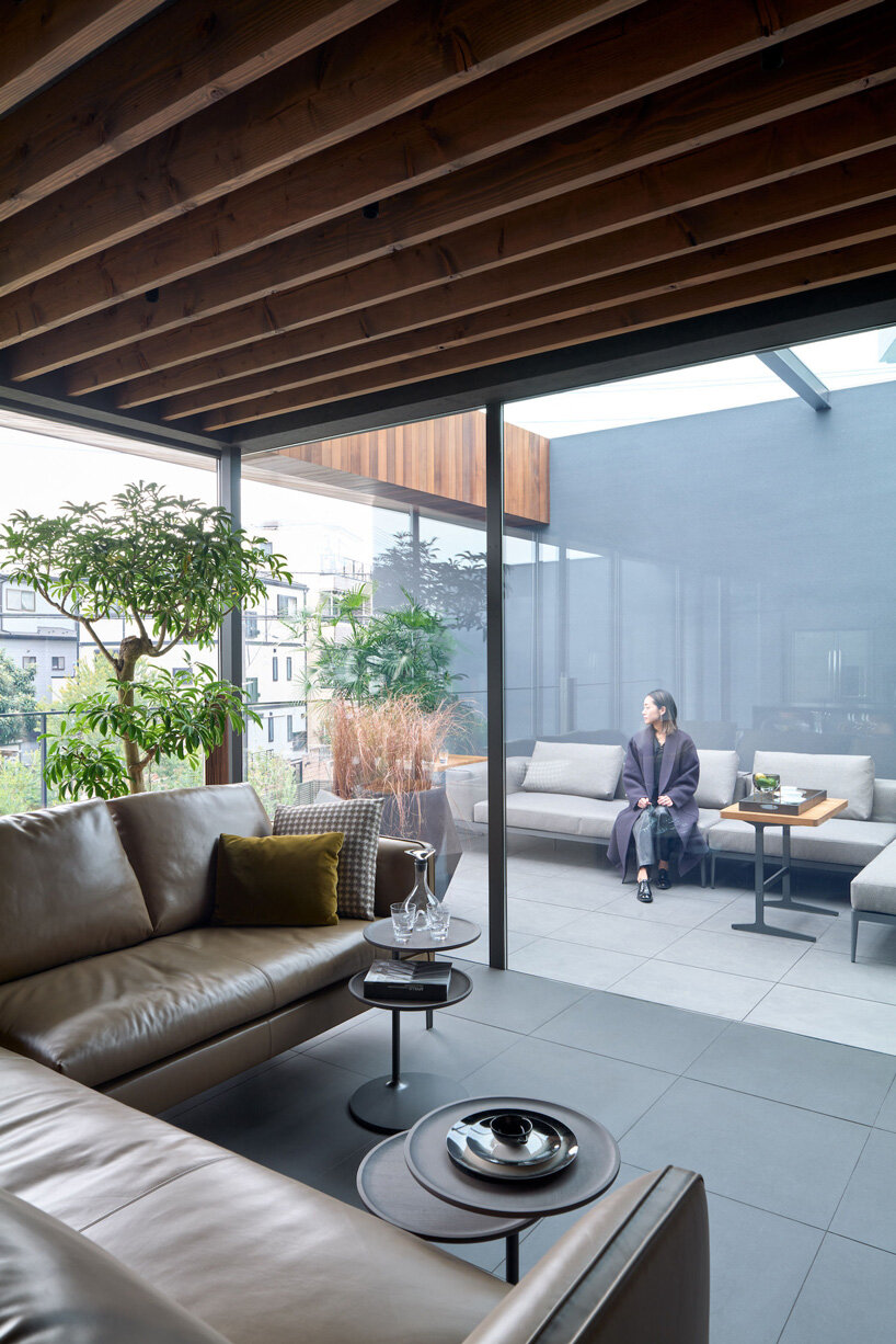 apollo architects & associates develops 'noble house' in japan around verdant garden