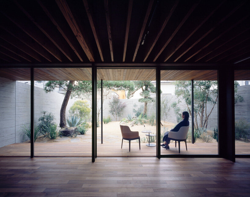 apollo architects & associates develops 'noble house' in japan around verdant garden