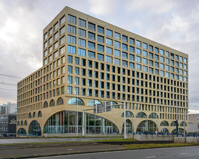 86 arches form studioninedots' 'westbeat' housing complex in amsterdam  