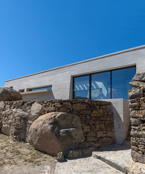 aristides dallas architects sets three-volume house between the rocks of tinos island