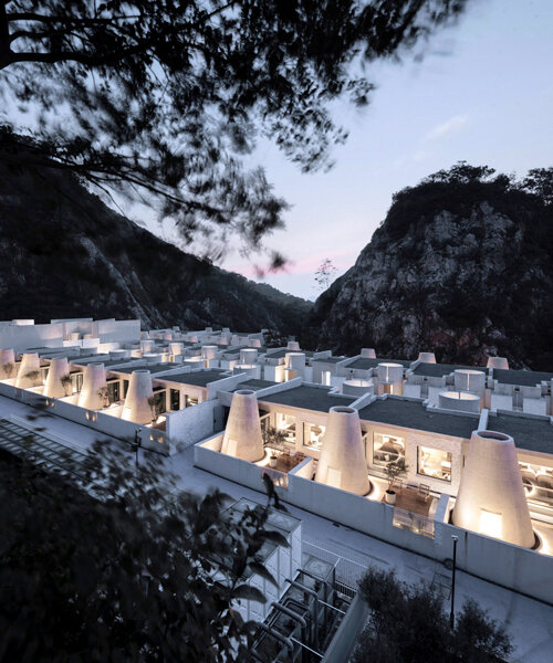 AZL architects' hotel made from white stone nestles into the hills of tangshan in china