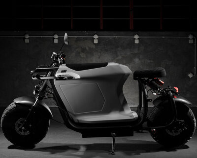 'bull-e' electric scooter merges faceted geometries with a cafe racer stance