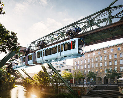büro+staubach's new cars for the world's oldest suspension railway in wuppertal, germany
