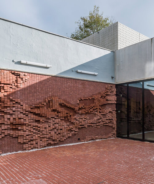 dmvA expresses mechelen's arts center nOna with undulating fields of brickwork
