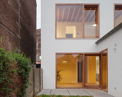 edouard brunet renovates, divides and extends KOW house in brussels