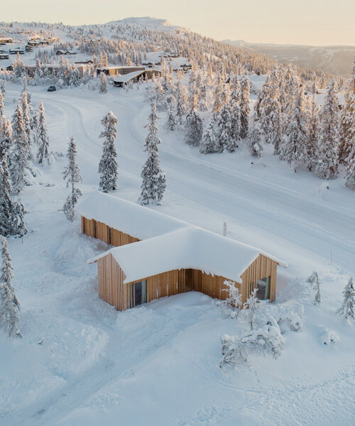 erling berg nestles its kvitfjell cabin atop a white mountain in norway
