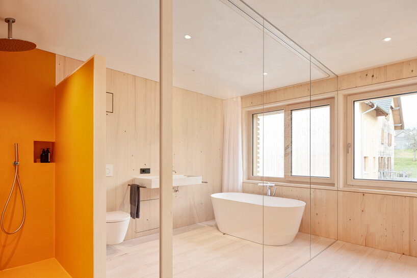 firm architekten builds cube house in austria using timber from the owner's private forest