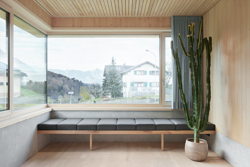 firm architekten builds cube house in austria using timber from the owner's private forest