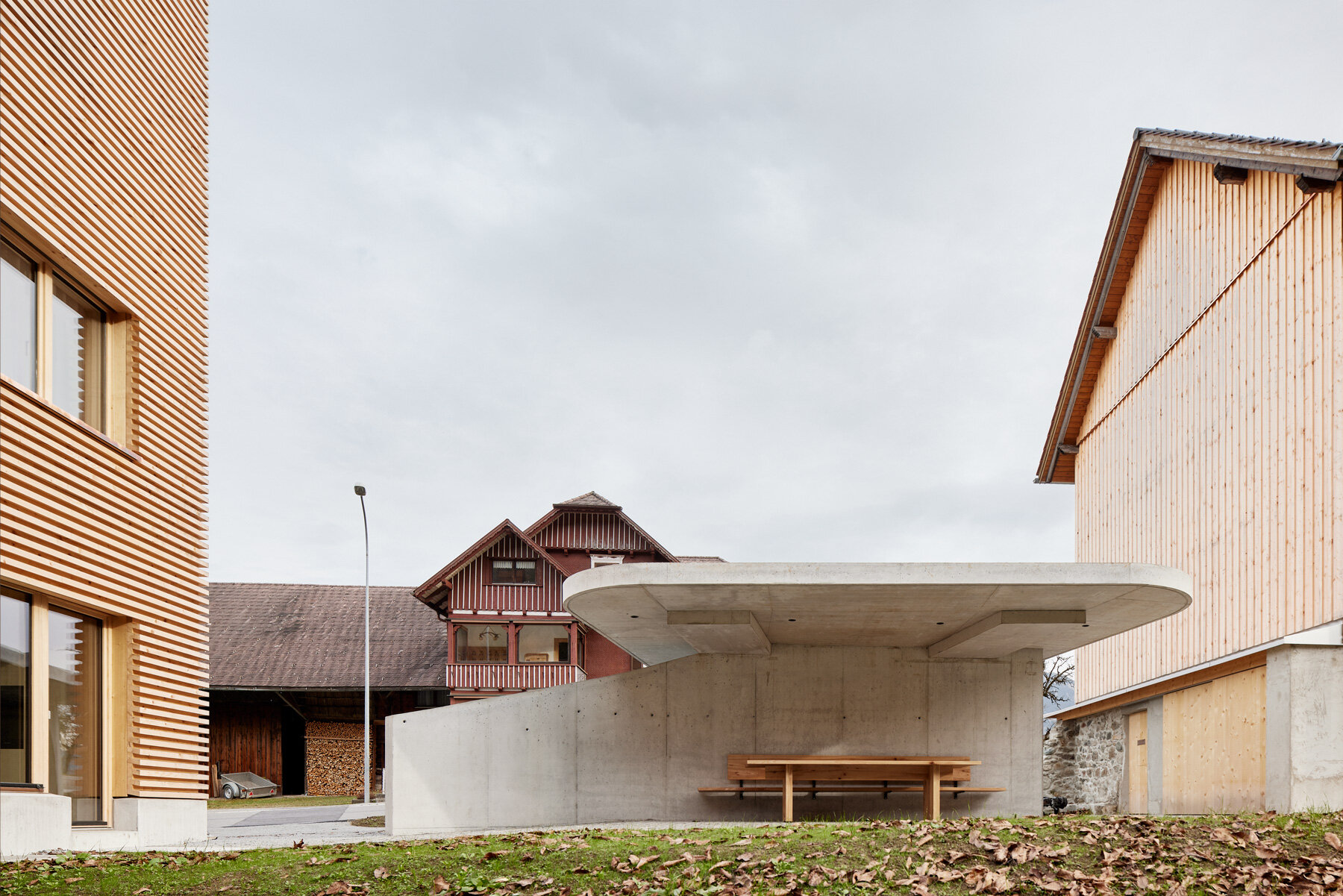 firm architekten builds cube house in austria using timber from the owner's private forest