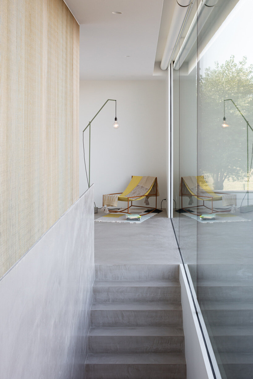 'residence DDE' by govaert & vanhoutte architects is a minimal concrete villa in rural belgium