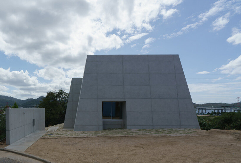 kazunori fujimoto architects builds fort-like house in japan with thick concrete exterior