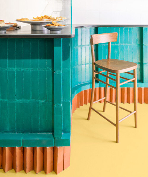 LINEARAMA shapes coastal genoese eatery with continuous, colorful brick bar feature