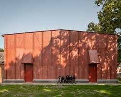 jonathan tuckey design completes red theater as part of school campus in south east england