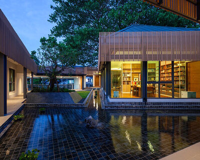 junsekino connects volumes around a lush courtyard for 'o-tree house' in thailand
