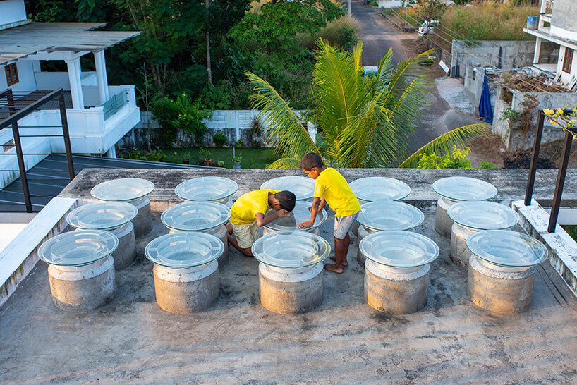 'house that rains light' by LIJO.RENY.architects is overflowing with greenery in kerala, india