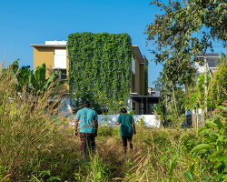 'house that rains light' by LIJO.RENY.architects is overflowing with greenery in kerala, india